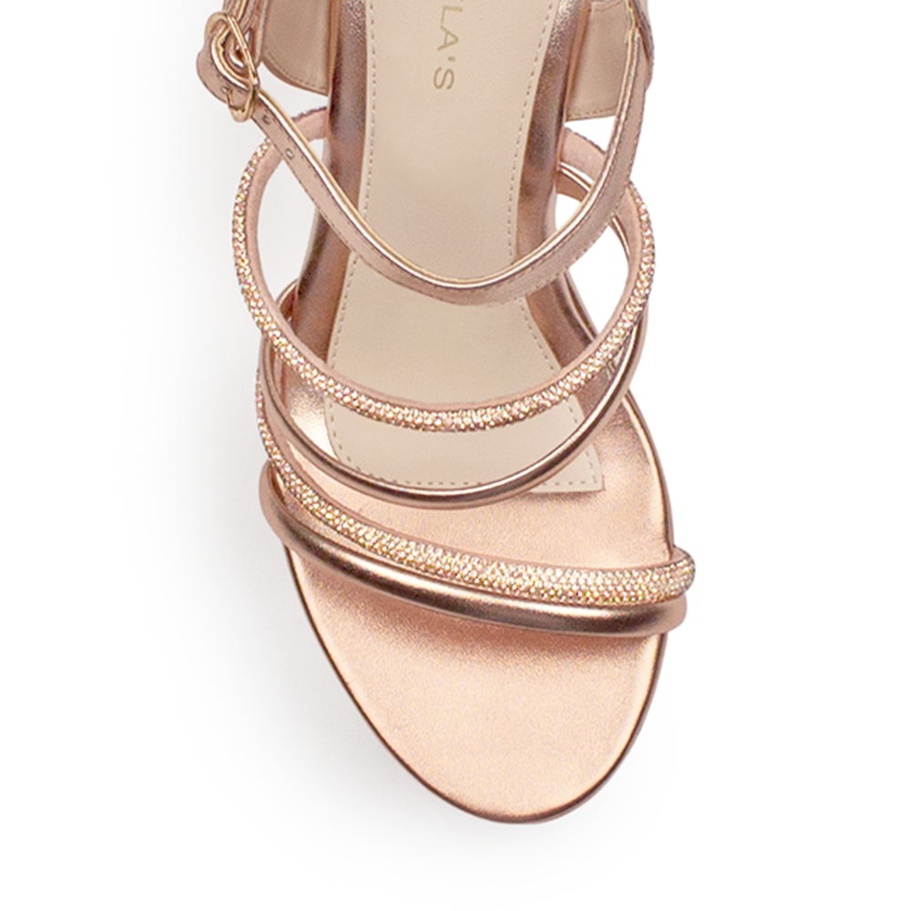 Vista de material sintético en zapatilla oro rosado para mujer con tiras de pedrería brillante