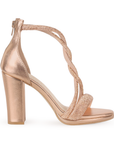 Vista lateral de zapatilla oro rosado para mujer con pedreria y tacón bloque de 10cm