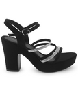 Vista lateral de zapatilla negra para mujer con tacón ancho de 10cm y tiras brillantes