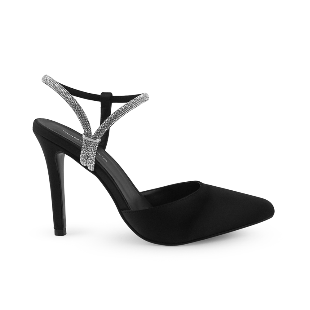vista lateral de zapatillas negras para dama destalonadas con punta fina, tacón alto 11cm y tiras brillantes