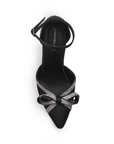 Vista superior de zapatilla negra para mujer con punta fina, moño y talón cerrado