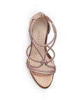 Vista superior de zapatilla oro rosado para mujer con pedrería brillante en tiras cruzadas 