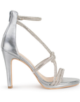 Vista lateral de zapatilla plata para mujer con pedrería brillante y tacón delgado de 10cm