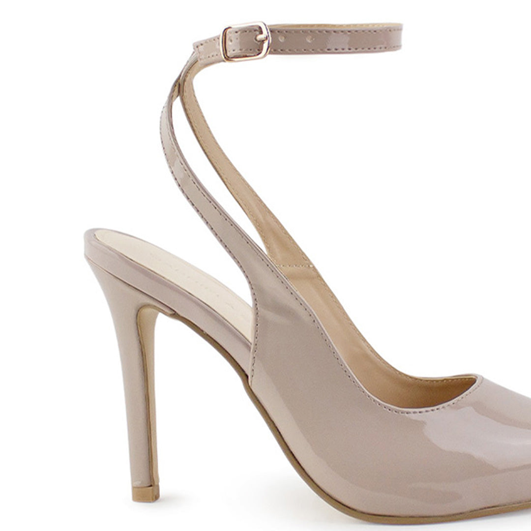 Vista trasera de tacón alto delgado de 11cm en zapatilla maquillaje para mujer con pulsera 