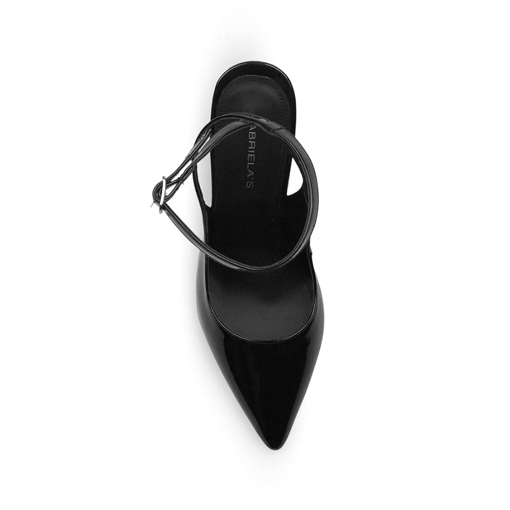 Vista superior de zapatilla negra para mujer con hebilla ajustable en pulsera 