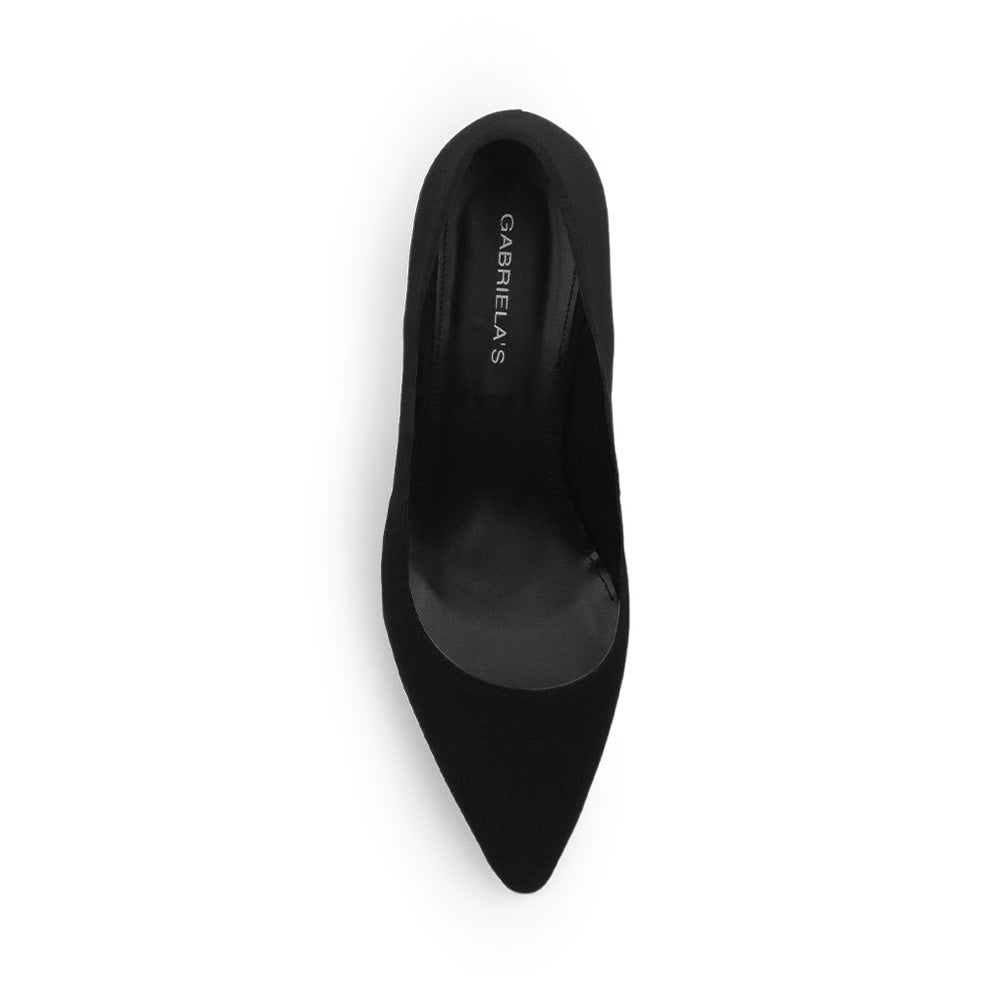 Vista superior de zapatilla para mujer con punta fina formal en color negro