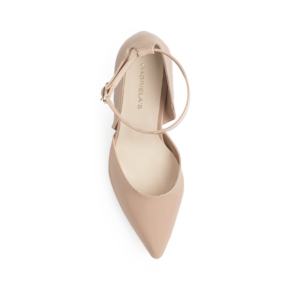 Vista superior de zapatilla maquillaje para mujer con punta fina y tacón delgado ajustable de pulsera al tobillo