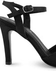 Vista trasera de tacón delgado medio de 10cm en zapatilla negra para mujer con pulsera ajustable