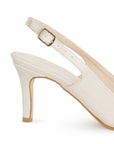 Vista trasera de tacón delgado de 8cm en zapatilla beige destalonada para mujer con moño en punta fina 