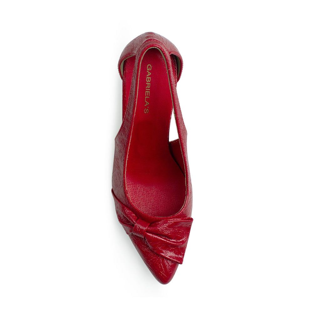 vista superior de zapatillas rojas puntales para dama con moño y tacón medio 8cm