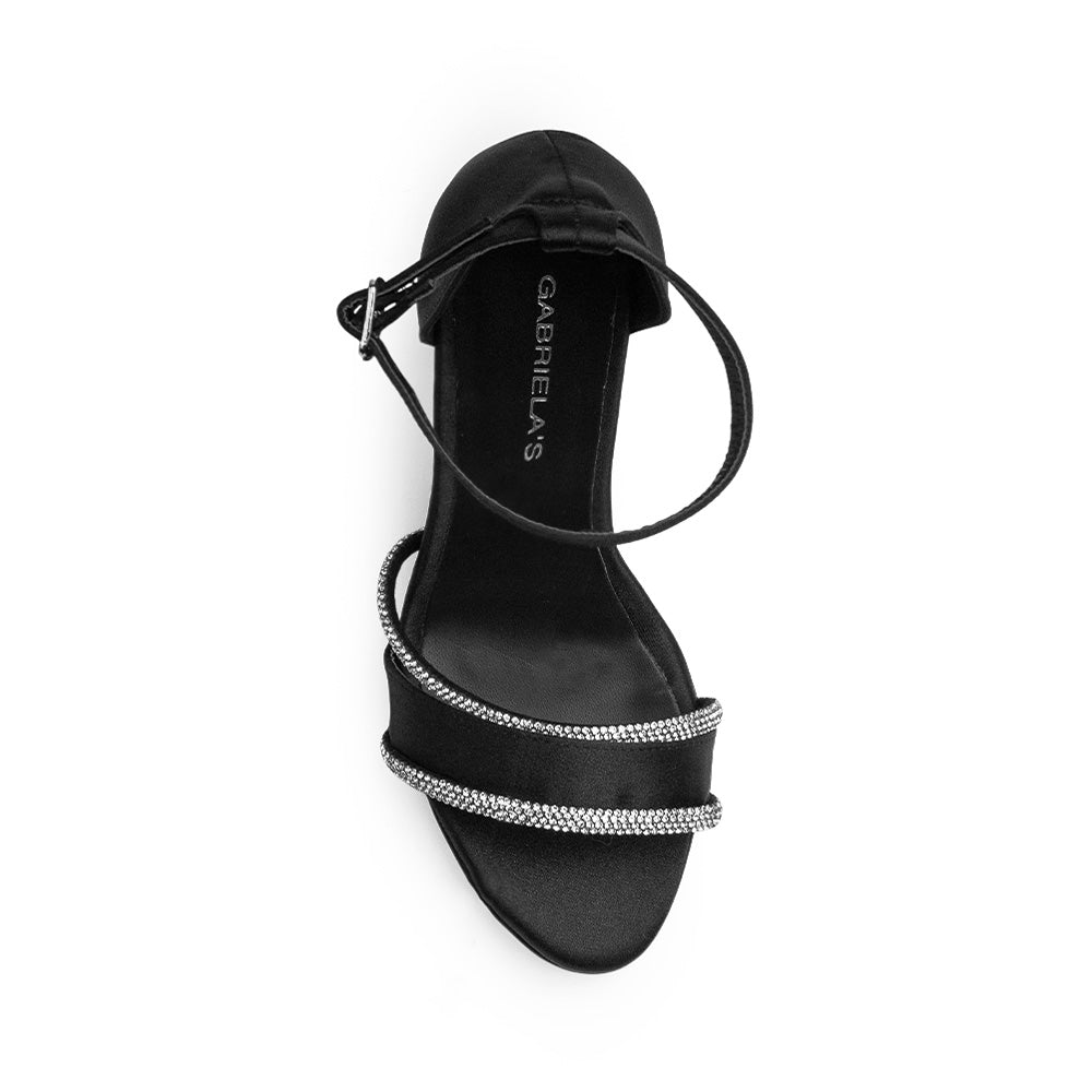 vista superior de zapatillas de fiesta negras para dama con tiras de pedrería y tacón medio 10 cm  