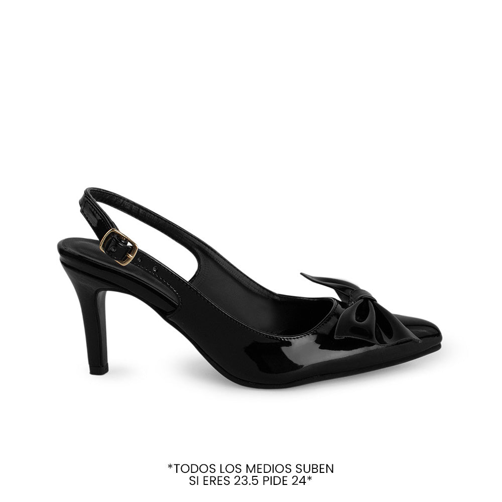 Vista superior de zapatilla negra  destalonada para mujer con un moño en punta fina cerrada y tacón delgado de 8cm tipo stiletto 