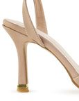 Vista trasera de tacón delgado medio de 10cm en zapatilla nude para mujer con pulsera ajustable de diseño descubierto 