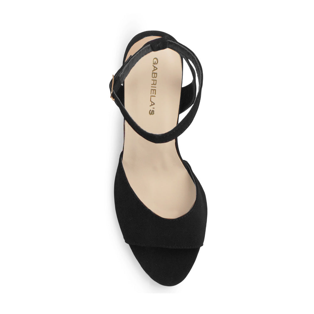 Vista superior de zapatilla negra para mujer de diseño descubierto con pulsera al tobillo y punta abierta