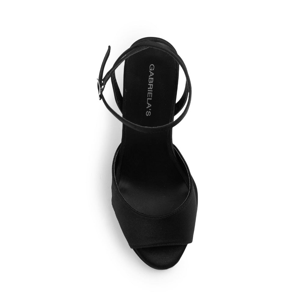 Vista superior de zapatilla negra para dama con punta abierta pulsera ajustable y tacón alto 11cm 