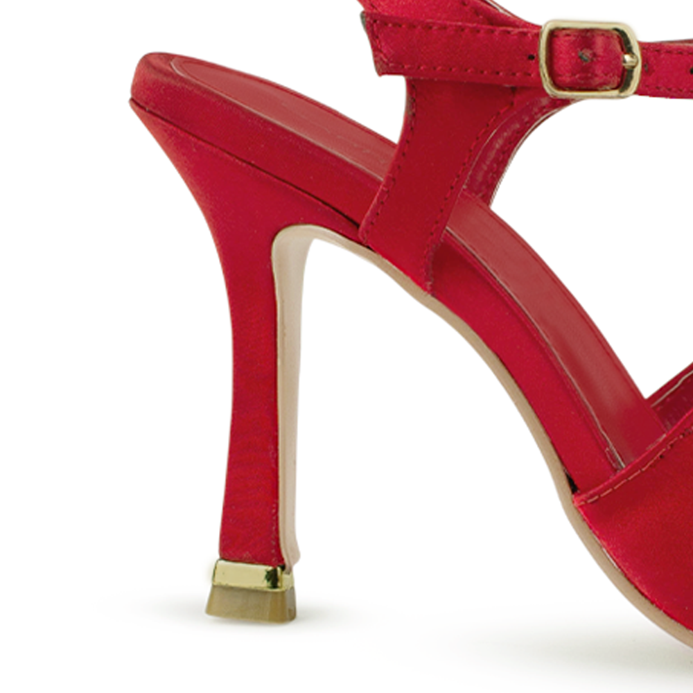Vista trasera de tacón delgado medio de 10cm en zapatilla roja destalonada para mujer con punta cerrada fina tipo stiletto