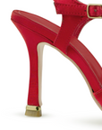 Vista trasera de tacón delgado medio de 10cm en zapatilla roja destalonada para mujer con punta cerrada fina tipo stiletto