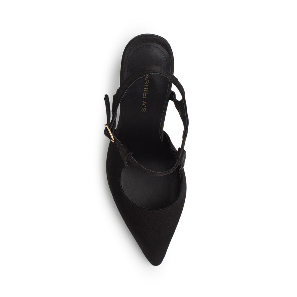 Vista superior de zapatilla negra destalonada para mujer con pulsera ajustable al tobillo y punta cerrada fina tipo stiletto