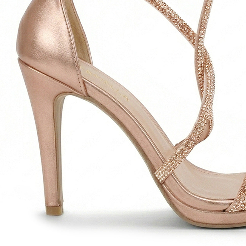 Vista trasera de tacón delgado medio de 10cm en zapatilla oro rosa de diseño descubierto para mujer con pedrería 