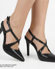 Zapatillas negras stiletto de charol destalonadas con tiras cruzadas al frente y tacón alto 11cm para dama