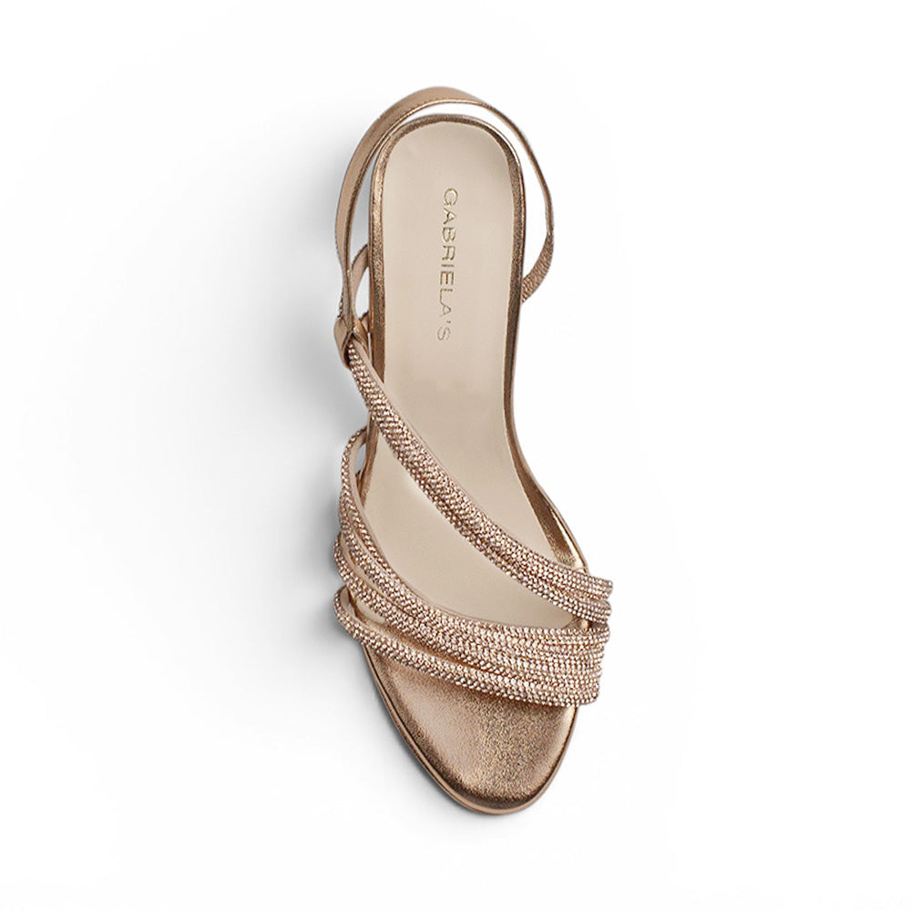 Vista superior de zapatilla de diseño descubierto para mujer con pedrería y tacón delgado de 8cm en color oro rosa