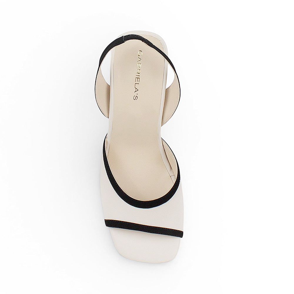 Vista superior de zapatillas beige con negro para dama con punta abierta y tacón medio 8cm