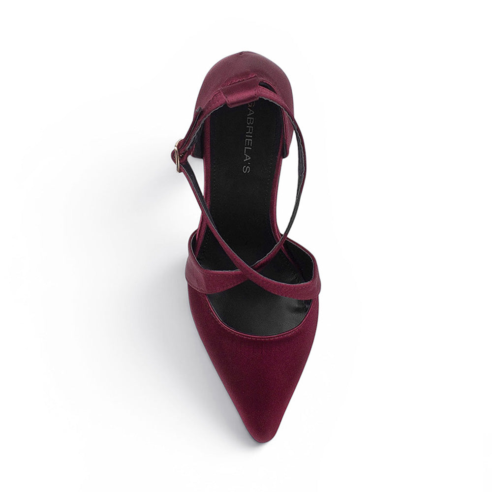 Vista superior de zapatilla tipo stiletto para mujer con punta fina cerrada y tiras cruzadas en color vino