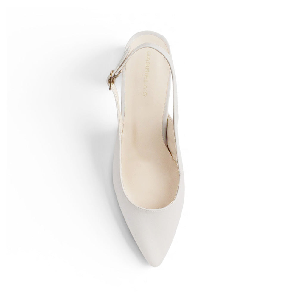vista superior de zapatillas stiletto para dama beige con talón descubierto 