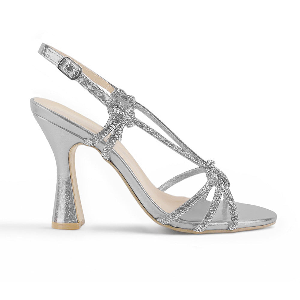 vista lateral de zapatillas plata para dama con tiras cruzadas y tacón alto 11cm