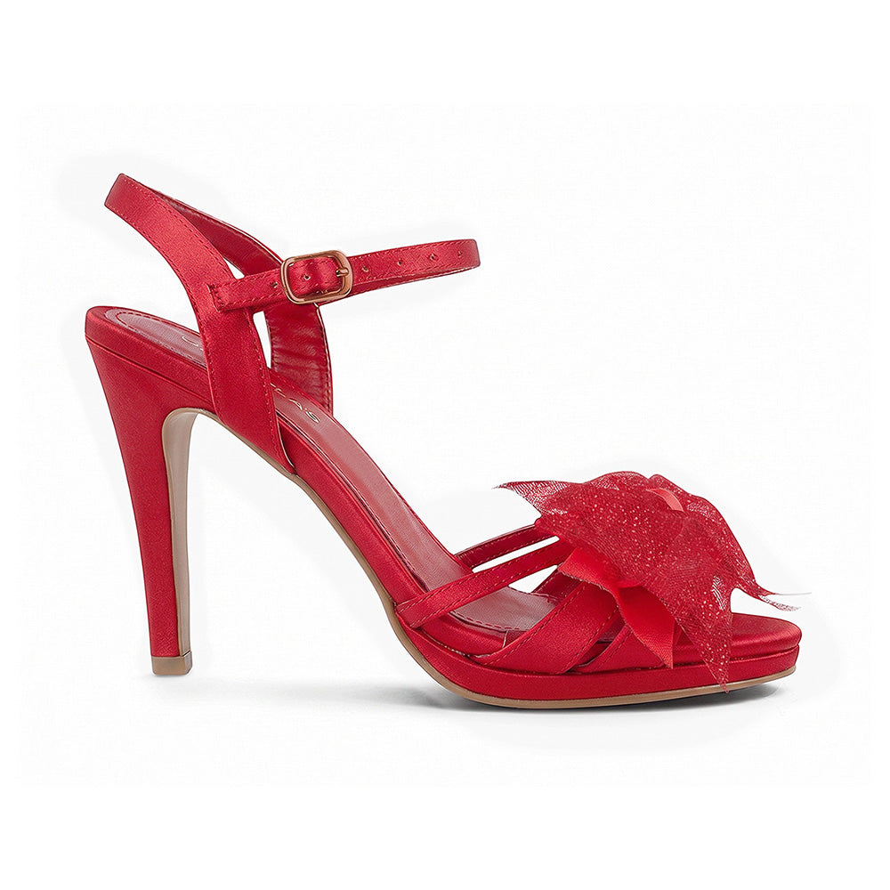 vista lateral de zapatillas rojas para dama con plataforma, moño y pulsera ajuste al tobillo tacón alto 11 cm 