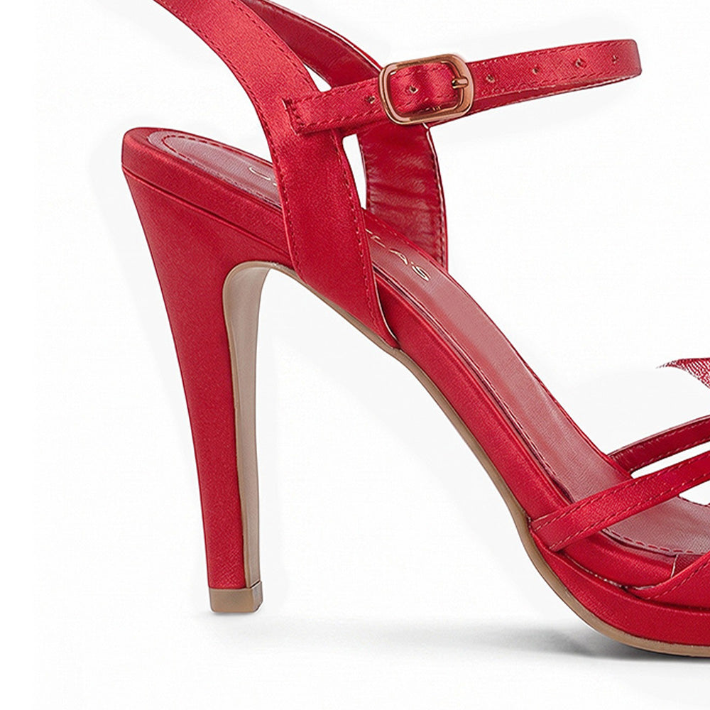 vista trasera del tacón alto 11 cm en zapatillas rojas para dama con ajuste al tobillo y moño 