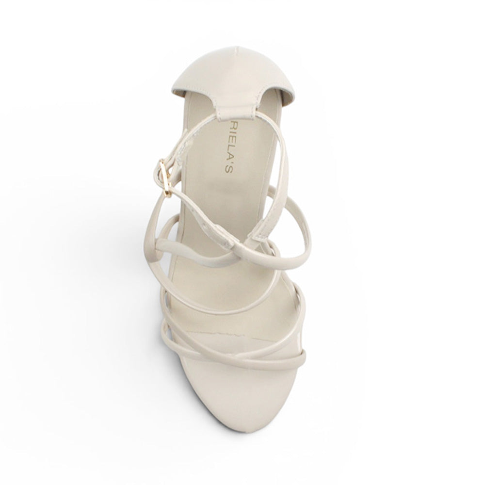 vista superior de zapatillas beige de charol con tiras cruzadas y tacón medio 10 cm para dama 