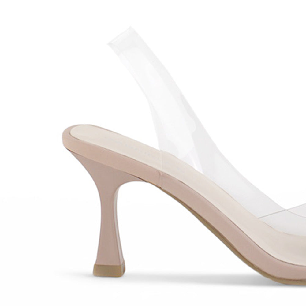 vista trasera del tacón medio 9cm en las zapatillas nude para dama con moño destalonadas 