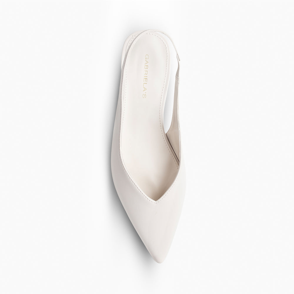 Vista superior de plataforma beige con punta fina para dama y pulsera ajustable 