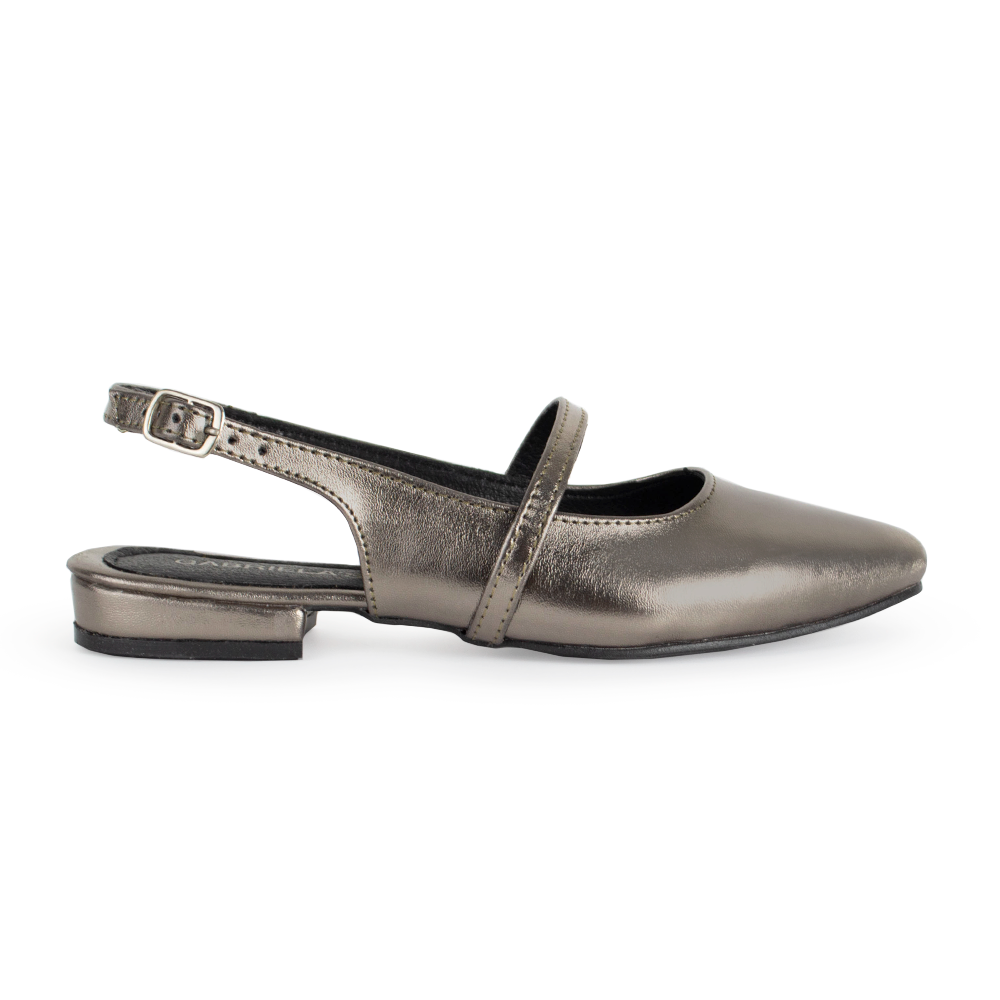 vista lateral de zapatillas grises para dama con tiras cruzadas
