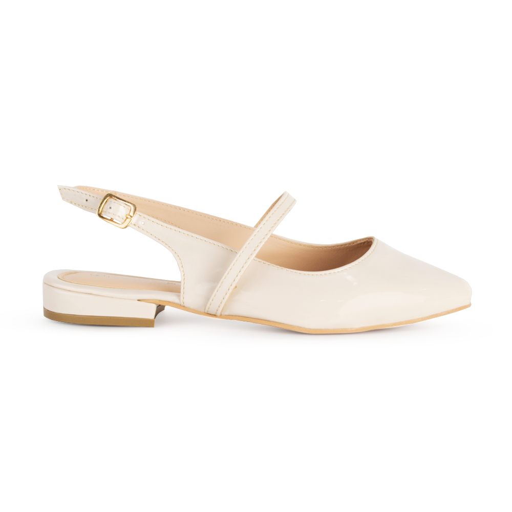 vista lateral de zapatillas beige de charol para dama con tiras cruzadas