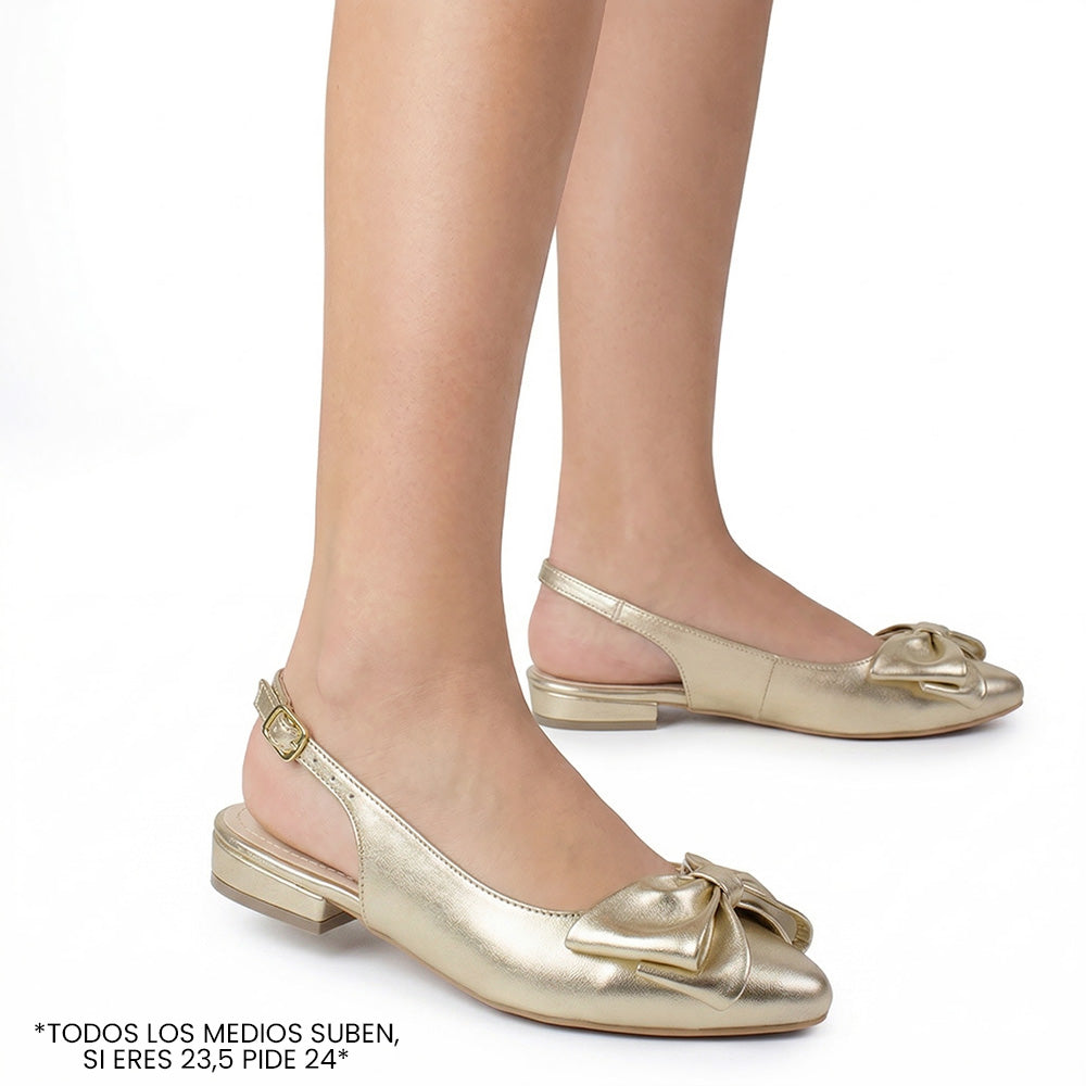 Flats dorados para mujer con moño en punta fina destalonado con correa ajustable