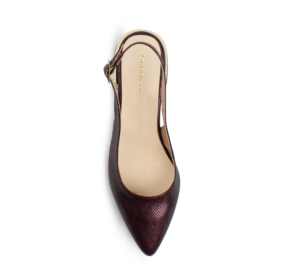 Vista superior de zapatilla vino destalonada para mujer con punta fina cerrada y correa ajustable 