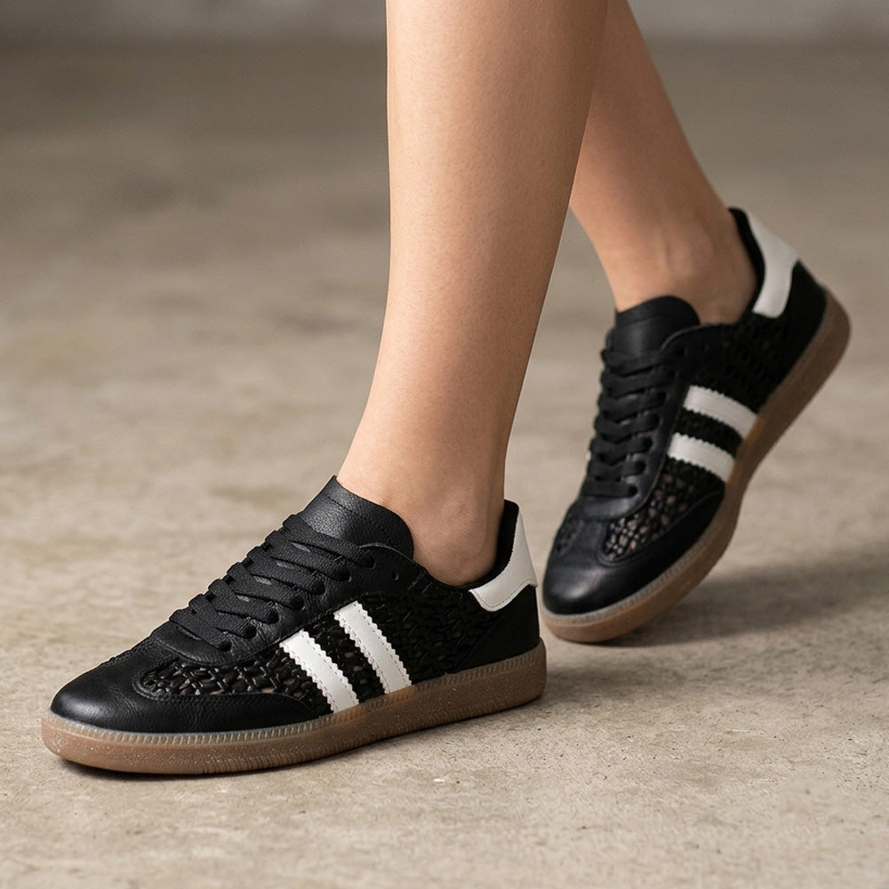 Tenis negros con blanco para dama y detalles tejidos de piso 