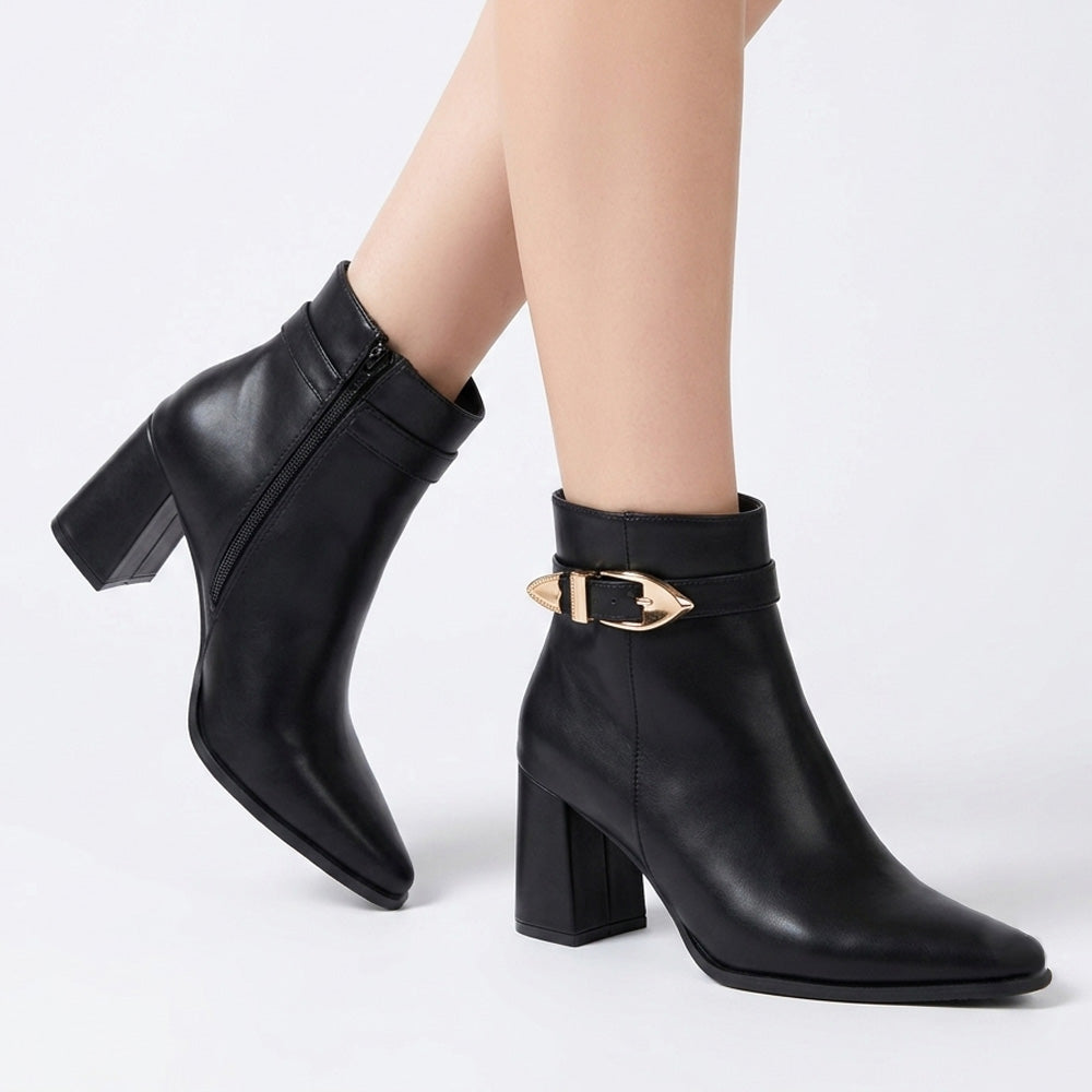 Botines negros de punta fina con herraje metálico y tacón medio 7cm para dama  
