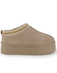 Vista lateral del botín beige tipo zueco para dama con detalle trenzado y plataforma baja 5cm 