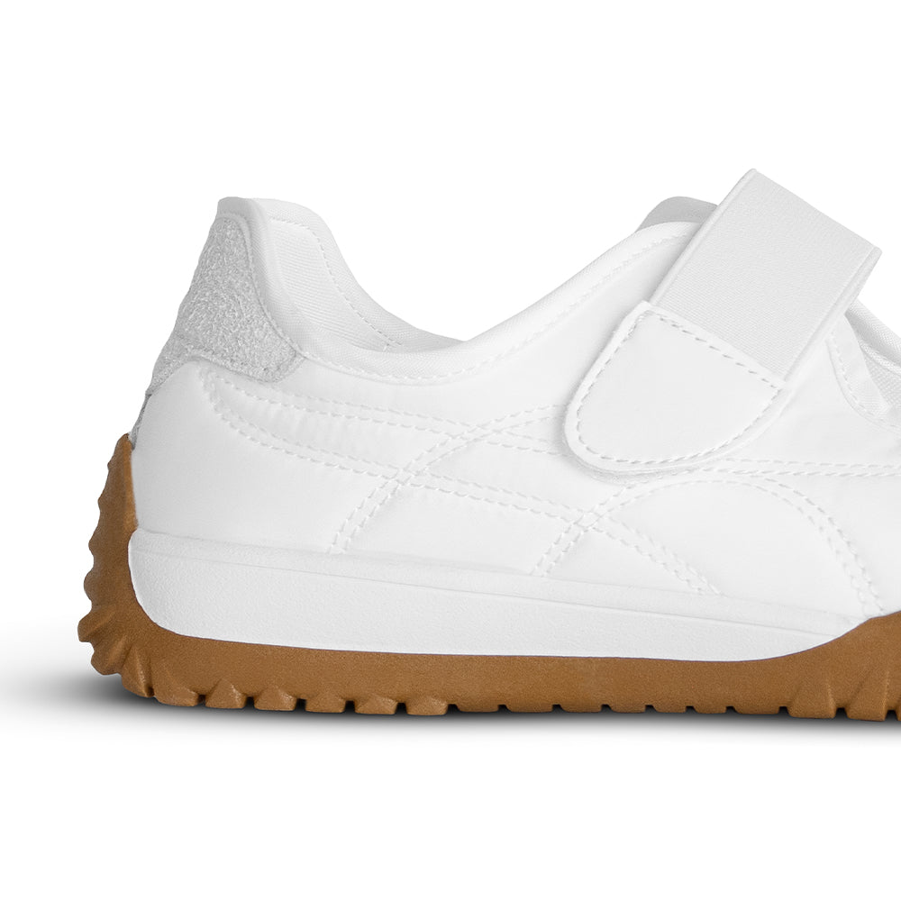 Vista trasera de la suela baja 4cm antiderrapante del tenis blanco casual para dama 