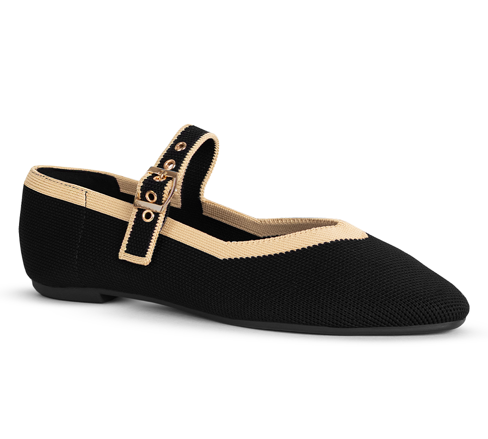 Vista diagonal en los flats tipo balerina negra con bordes beige, suela de piso y pulsera ajustable para dama 