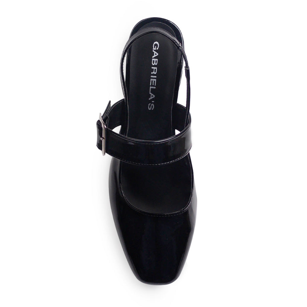 Vista superior de zapatilla negra destalonada para mujer con punta cerrada y taco ancho de 5cm