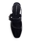 Vista superior de zapatilla negra destalonada para mujer con punta cerrada y taco ancho de 5cm