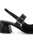 Vista trasera de tacón ancho bajo de 5cm en zapatilla destalonada para mujer con punta cerrada color negro