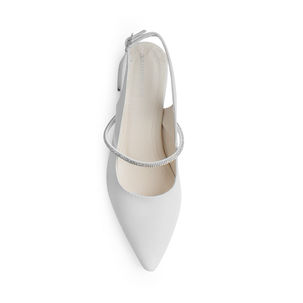 Vista superior de zapatilla beige para mujer con tira de pedrería punta fina cerrada y destalonada
