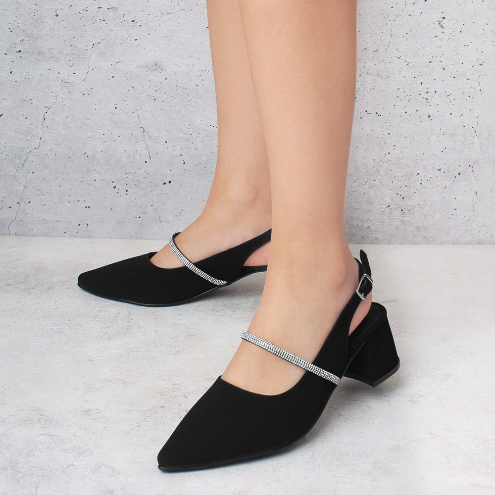 Zapatillas negras destalonadas para mujer de punta fina cerrada con tira de pedrería y tacón bajo de 6cm