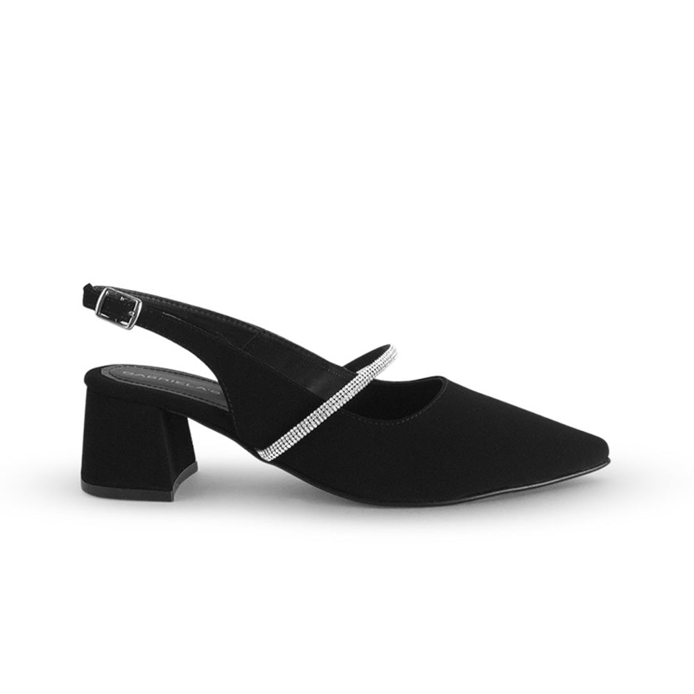 Vista lateral de zapatilla negra destalonada para mujer con tira de pedrería punta cerrada fina y tacón bajo de 6cm 