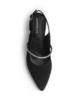 Vista superior de zapatilla negra para mujer con tira de pedrería punta fina cerrada y destalonada